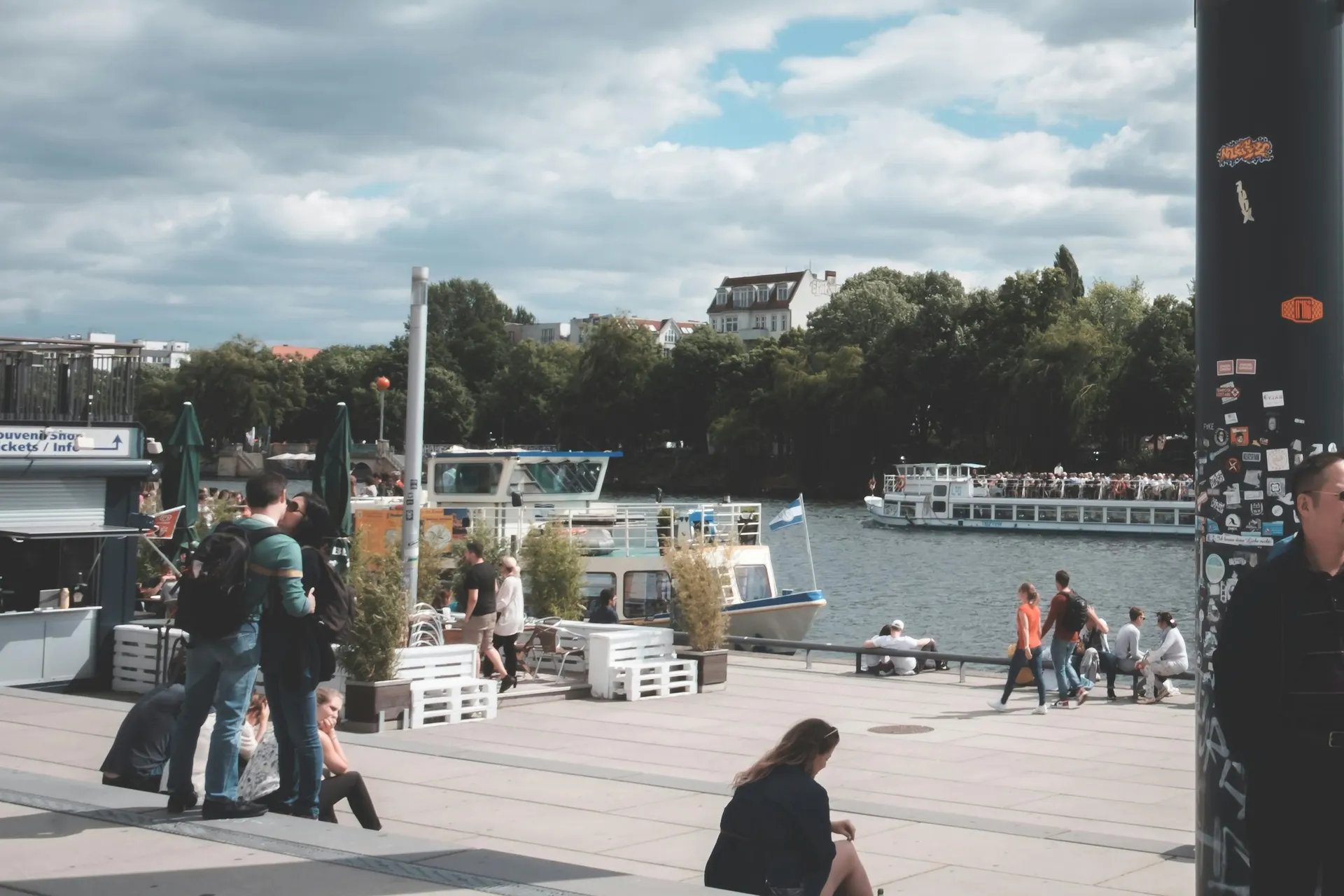 Family walking along an Irish river promenade